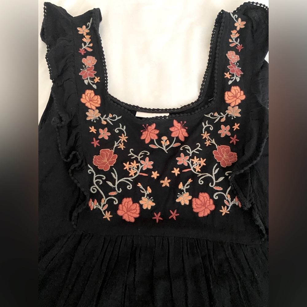 Embroidery tank/baby doll top.